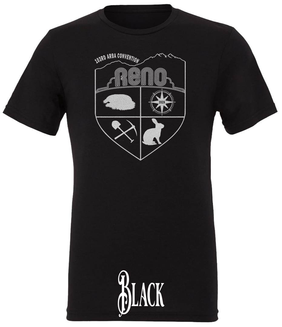 Black triblend t-shirt with the Biggest Little Reunion crest in metallic silver - a rabbit, a cavy, a pick and shovel, and a compass under the Reno arch. 103rd ARBA Convention.