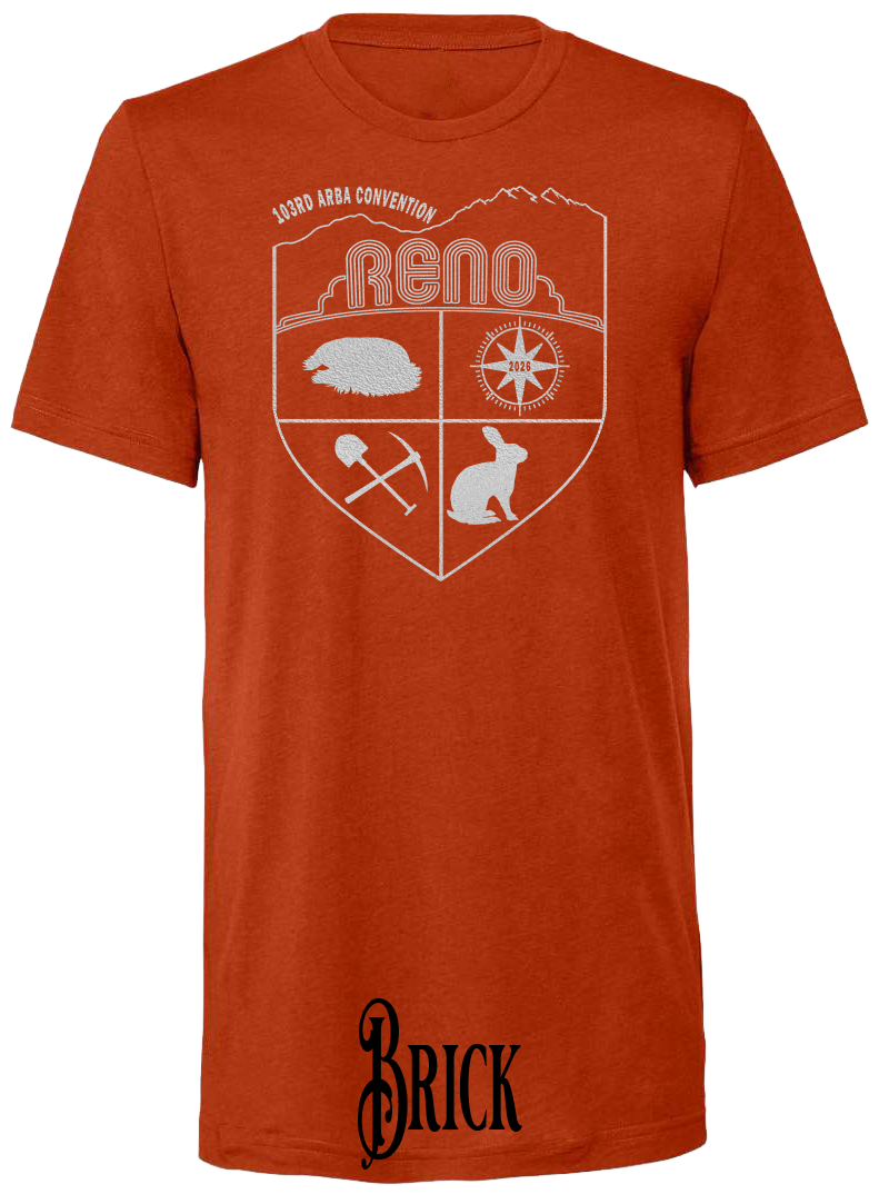 Brick triblend t-shirt with the Biggest Little Reunion crest in metallic silver - a rabbit, a cavy, a pick and shovel, and a compass under the Reno arch. 103rd ARBA Convention.