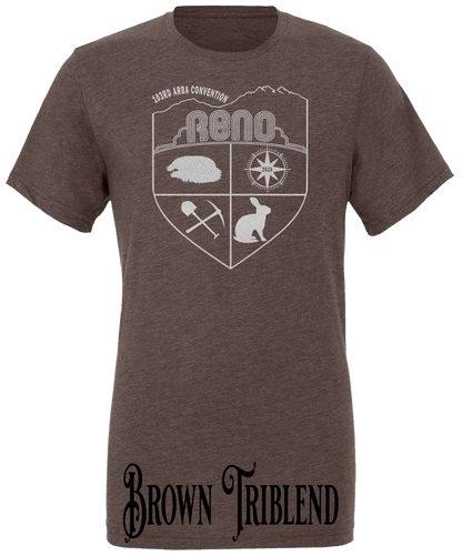 Brown triblend t-shirt with the Biggest Little Reunion crest in metallic silver - a rabbit, a cavy, a pick and shovel, and a compass under the Reno arch. 103rd ARBA Convention.