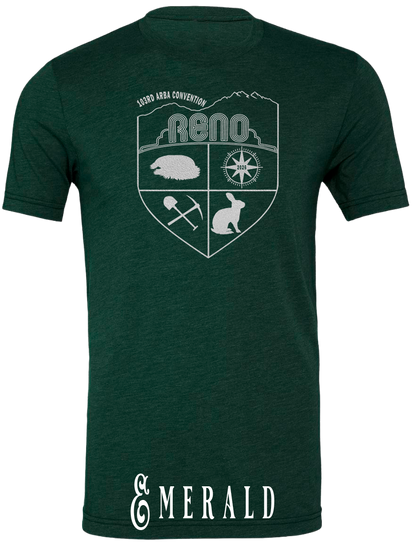 Emerald triblend t-shirt with the Biggest Little Reunion crest in metallic silver - a rabbit, a cavy, a pick and shovel, and a compass under the Reno arch. 103rd ARBA Convention.