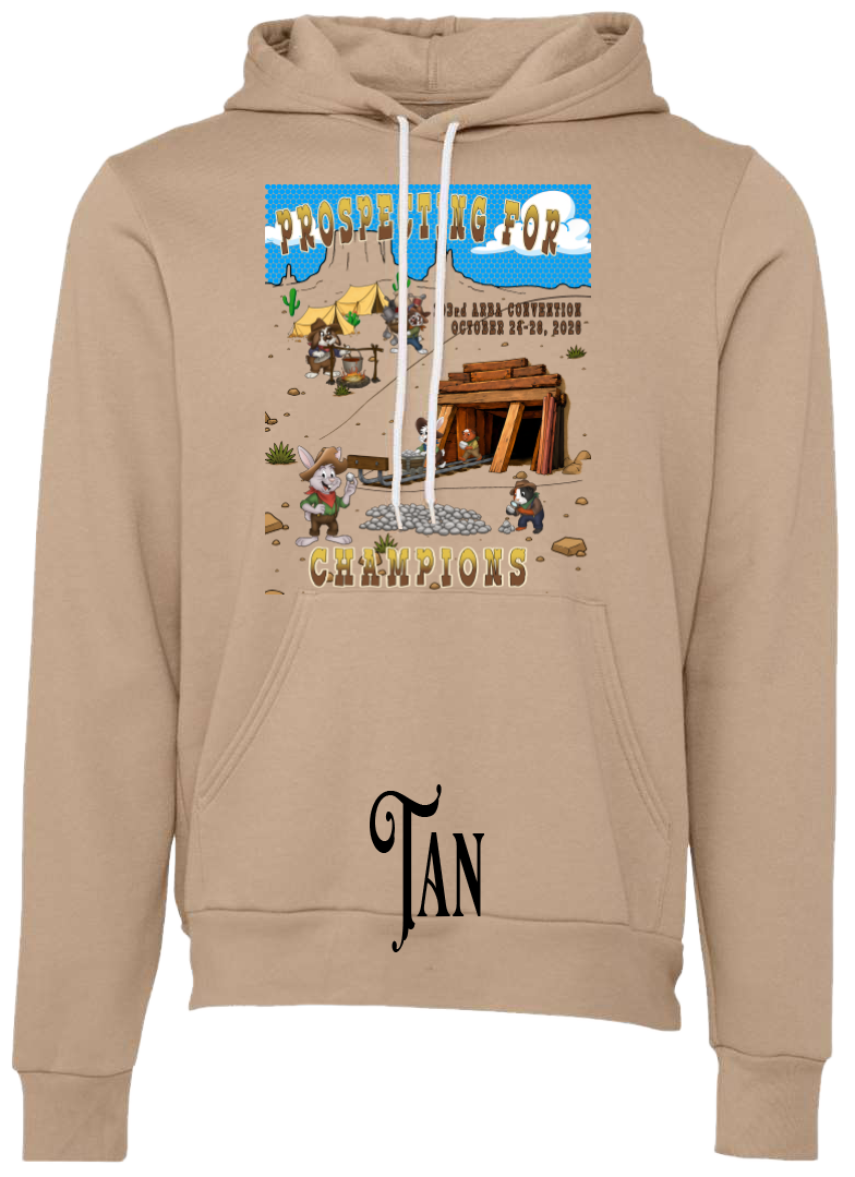 Tan fleece hoodie with the Prospecting for Champions design on the chest, showing cartoon rabbit and cavy prospectors working a silver claim. 103rd ARBA Convention, Reno.
