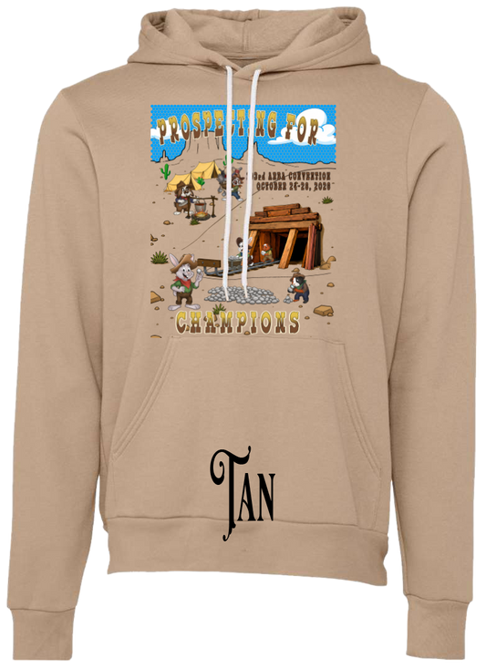Tan fleece hoodie with the Prospecting for Champions design on the chest, showing cartoon rabbit and cavy prospectors working a silver claim. 103rd ARBA Convention, Reno.