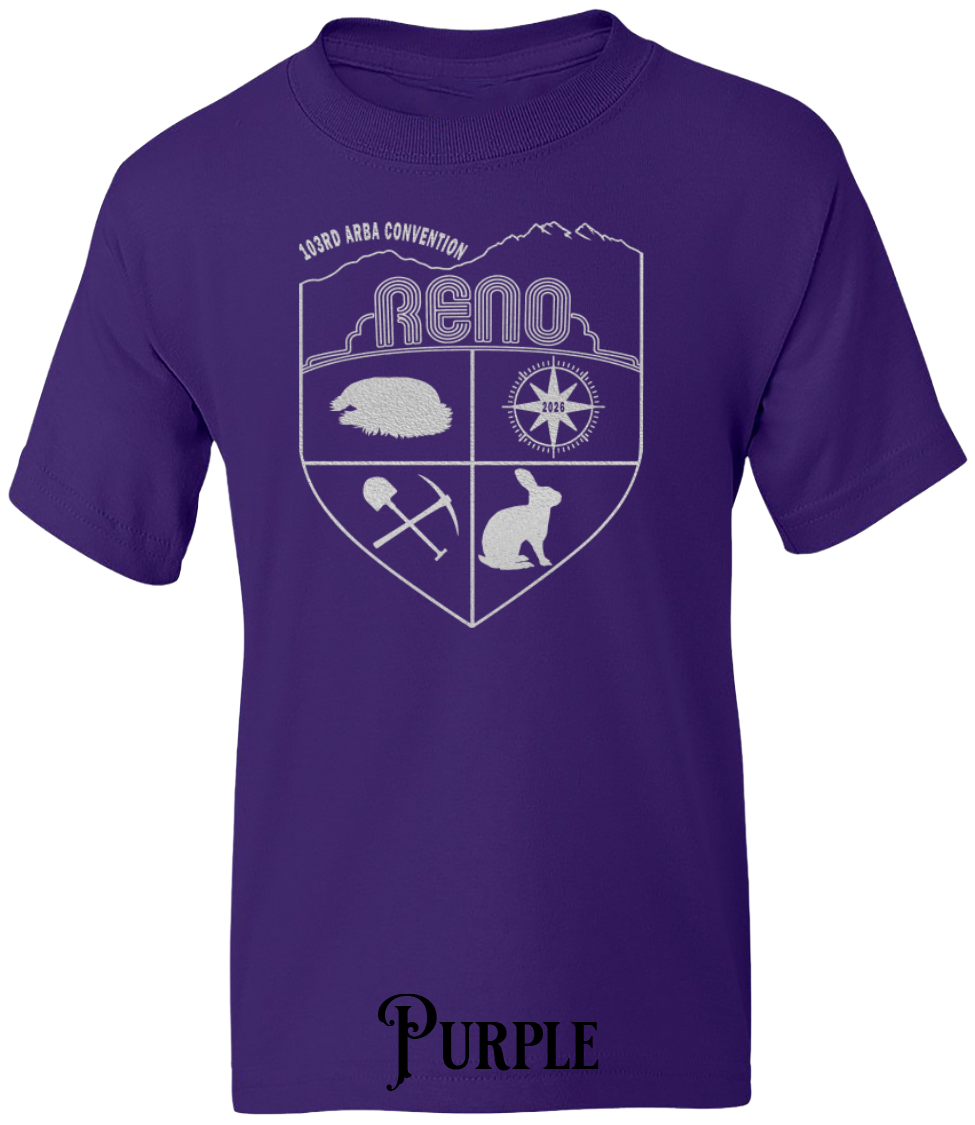 Purple youth t-shirt with the Biggest Little Reunion crest in metallic silver - a rabbit, a cavy, a pick and shovel, and a compass under the Reno arch. 103rd ARBA Convention.