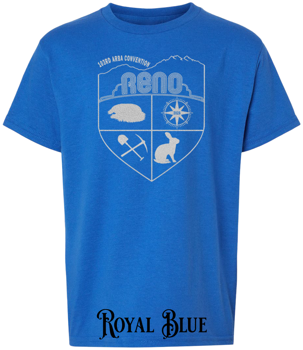 Royal Blue youth t-shirt with the Biggest Little Reunion crest in metallic silver - a rabbit, a cavy, a pick and shovel, and a compass under the Reno arch. 103rd ARBA Convention.