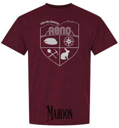 Maroon plus size t-shirt with the Biggest Little Reunion crest in metallic silver - a rabbit, a cavy, a pick and shovel, and a compass under the Reno arch. 103rd ARBA Convention.