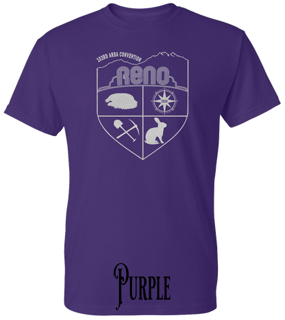 Purple plus size t-shirt with the Biggest Little Reunion crest in metallic silver - a rabbit, a cavy, a pick and shovel, and a compass under the Reno arch. 103rd ARBA Convention.