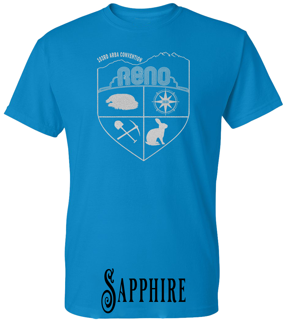 Sapphire plus size t-shirt with the Biggest Little Reunion crest in metallic silver - a rabbit, a cavy, a pick and shovel, and a compass under the Reno arch. 103rd ARBA Convention.