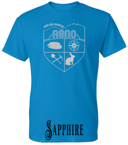 Sapphire plus size t-shirt with the Biggest Little Reunion crest in metallic silver - a rabbit, a cavy, a pick and shovel, and a compass under the Reno arch. 103rd ARBA Convention.