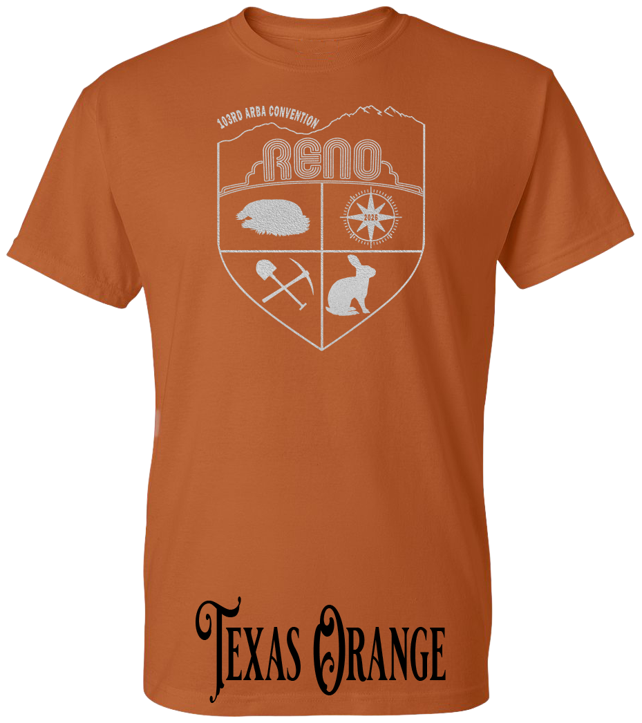 Texas Orange plus size t-shirt with the Biggest Little Reunion crest in metallic silver - a rabbit, a cavy, a pick and shovel, and a compass under the Reno arch. 103rd ARBA Convention.