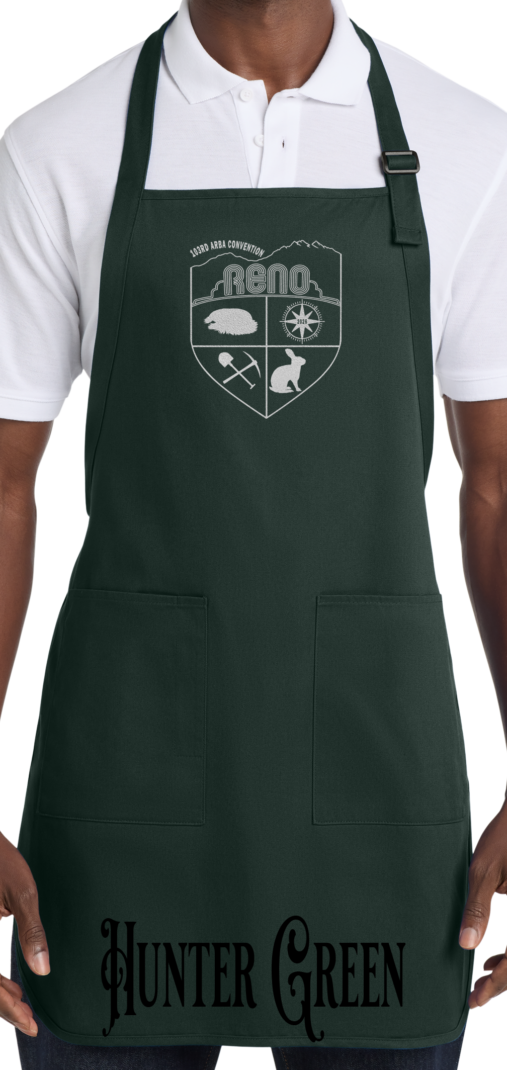 Hunter Green apron with the Biggest Little Reunion crest in metallic silver - a rabbit, a cavy, a pick and shovel, and a compass under the Reno arch. 103rd ARBA Convention.