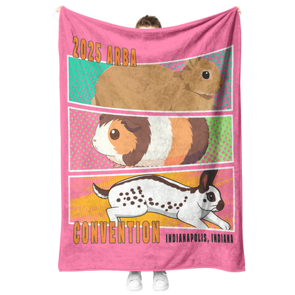 Comic_Book_Fleece_Blanket-PINK_V_Blanket_Model_Mockup.png